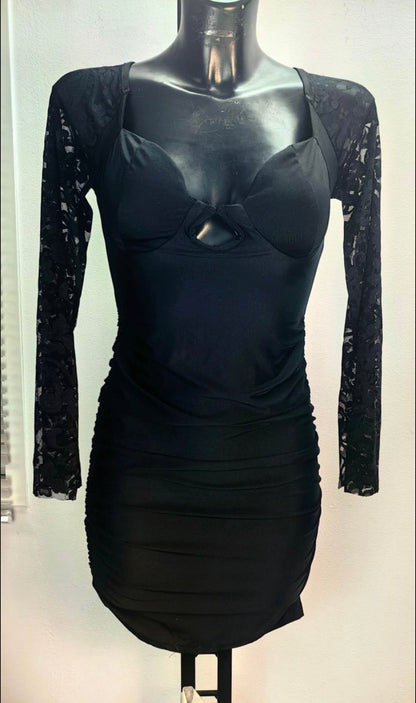 Abito elegante in tessuto leggero con scollo a V e maniche lunghe