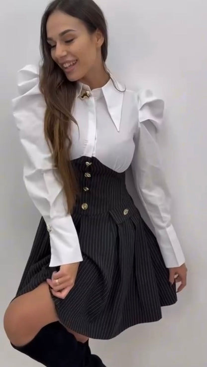 Abito elegante in tessuto leggero con scollo a V e maniche lunghe